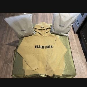 Fear of god knitted essential hoodie sweater amber color